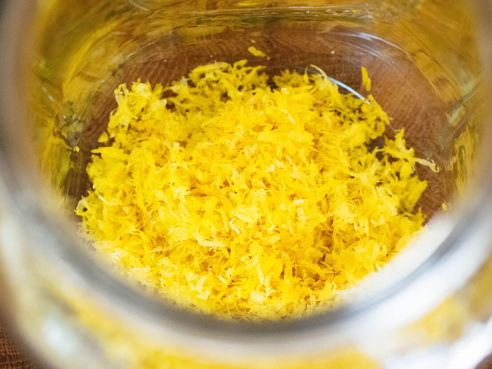 Lemon zest in the bottom of a jar